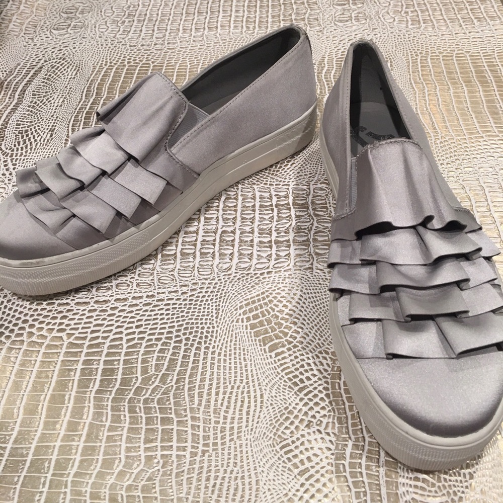 Report Ruffle slip ons